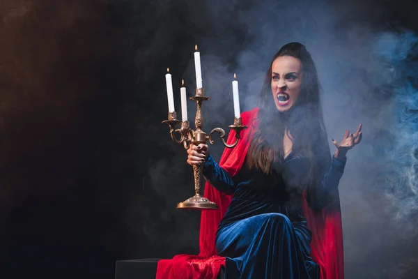 Mystery Woman Vampire Costume Holding Antique Candelabrum Dark Background Smoke — Free Stock Photo