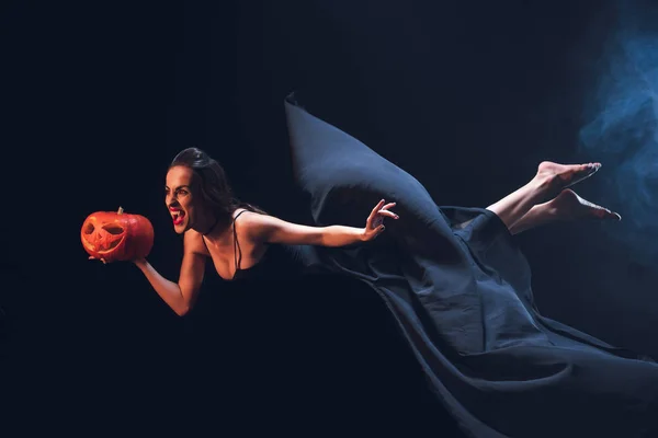 Woman Vampire Costume Holding Jack Lantern Flying Darkness Smoke — Stock Photo, Image