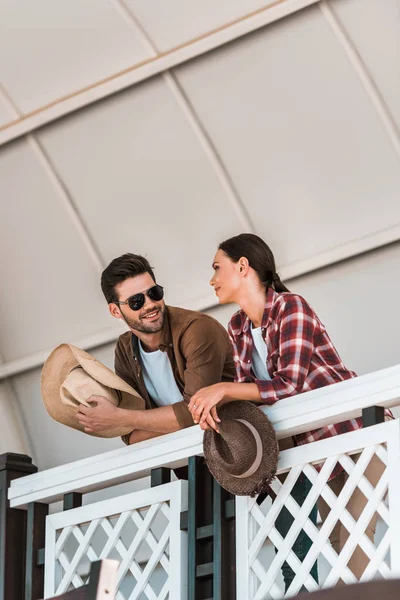 Man Woman Leaning Tribune Railing Looking Each Other Ranch Stadium — Stock Photo, Image