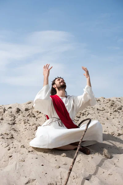 Cheerful Jesus Robe Red Sash Sitting Lotus Position Raised Hands — Stock Photo, Image