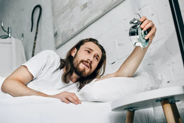 Selective Focus Jesus Turning Alarm Clock Bed Home — Free Stock Photo