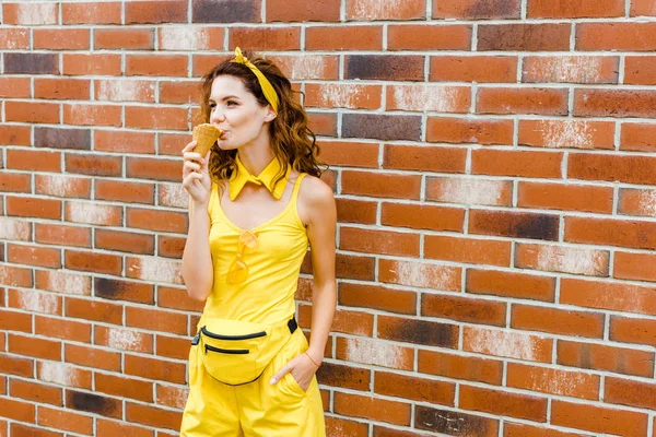 Stylish Young Woman Yellow Clothes Eating Ice Cream Front Brick — Stock Photo, Image