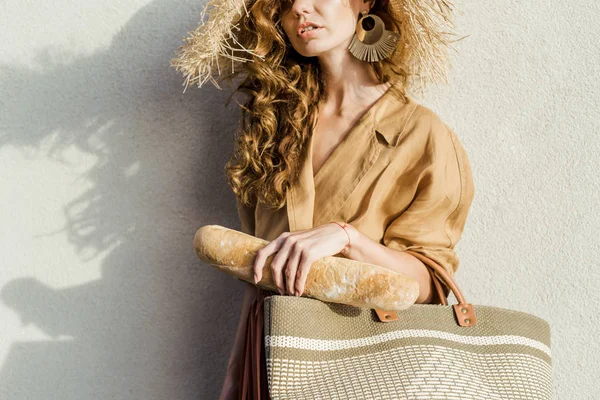 Cropped Shot Stylish Woman Straw Hat Baguette Standing Front White — Stock Photo, Image