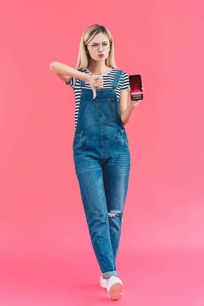 Young Woman Smartphone Showing Thumb Pink Backdrop — Free Stock Photo