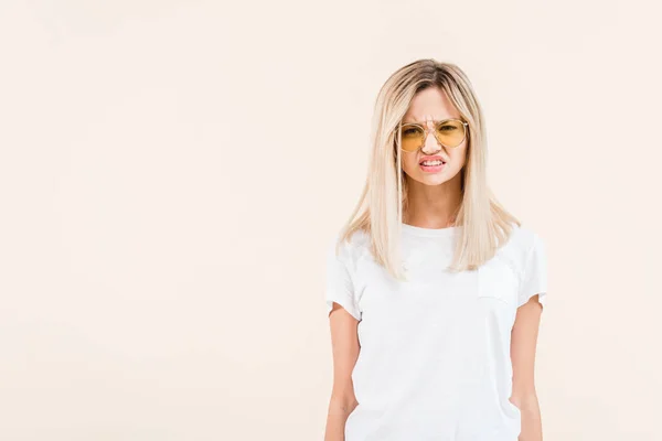 Upset Young Woman Sunglasses Frowning Looking Camera Isolated Beige — Stock Photo, Image