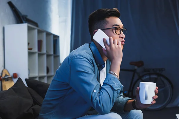 Side View Young Asian Man Eyeglasses Holdign Cup Talking Smartphone — Stock Photo, Image