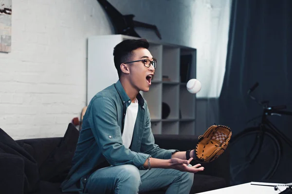 Emotional Young Asian Man Baseball Glove Ball Sitting Couch Watching — Stock Photo, Image