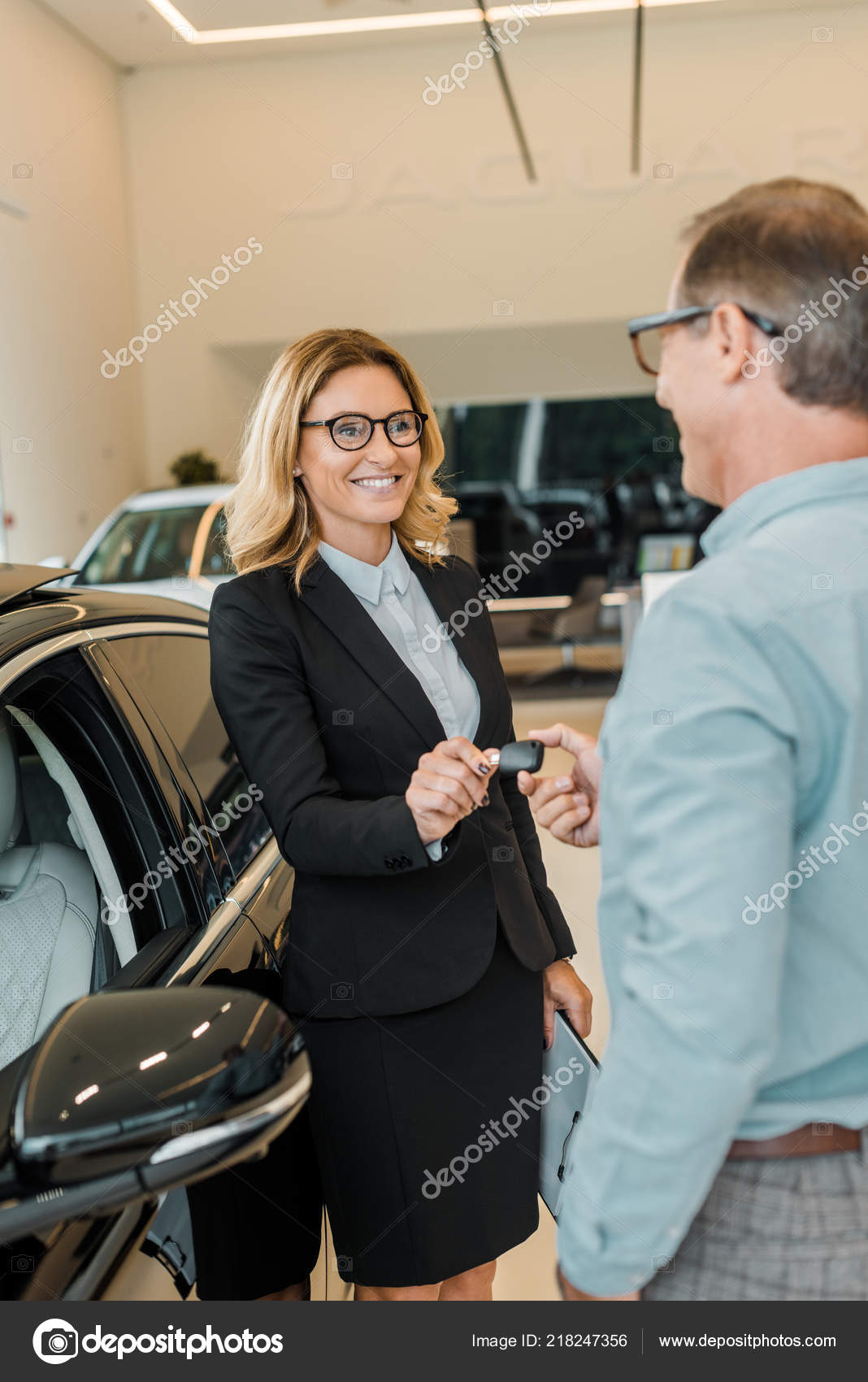Key Car Dealership >> Adult Man Taking Car Key Female Car Dealer Showroom Stock Key Car Dealership >> Adult Man Taking Car Key Female Car Dealer Showroom Stock
