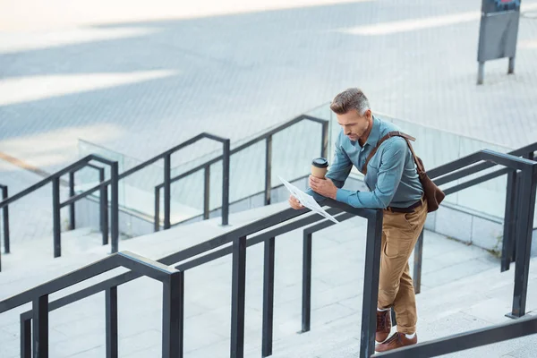 High Angle View Middle Aged Businessman Holding Coffee Reading Newspaper — Stock Photo, Image