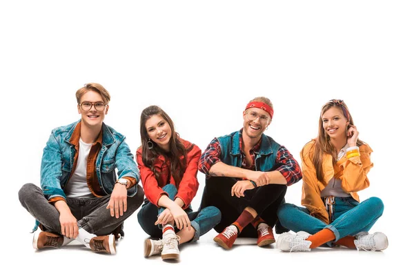 Smiling Hipster Friends Sitting Floor Looking Camera Isolated White — Stock Photo, Image