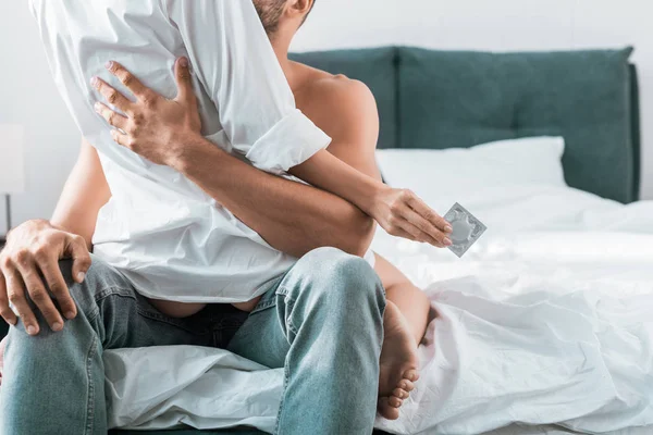 Cropped Shot Passionate Couple Condom Sitting Bed — Stock Photo, Image