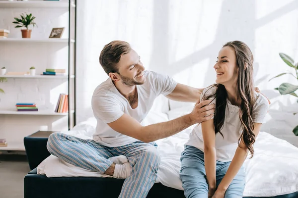 Laughing Young Couple Having Fun While Sitting Bed Morning — Stock Photo, Image