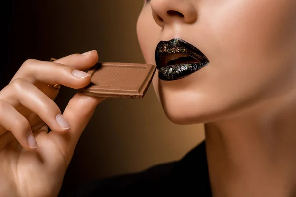 Close Woman Black Lips Chocolate — Stock Photo, Image