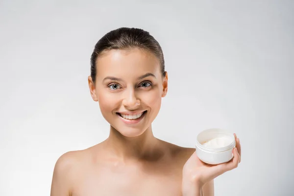 Young Beautiful Woman Holding White Body Cream — Free Stock Photo