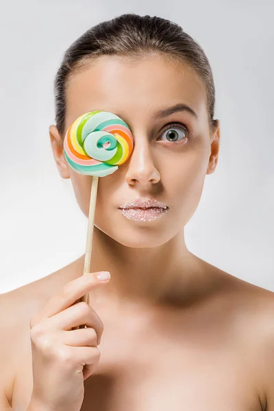 Young Attractive Woman Sugar Lips Hiding Colored Lollipop — Free Stock Photo