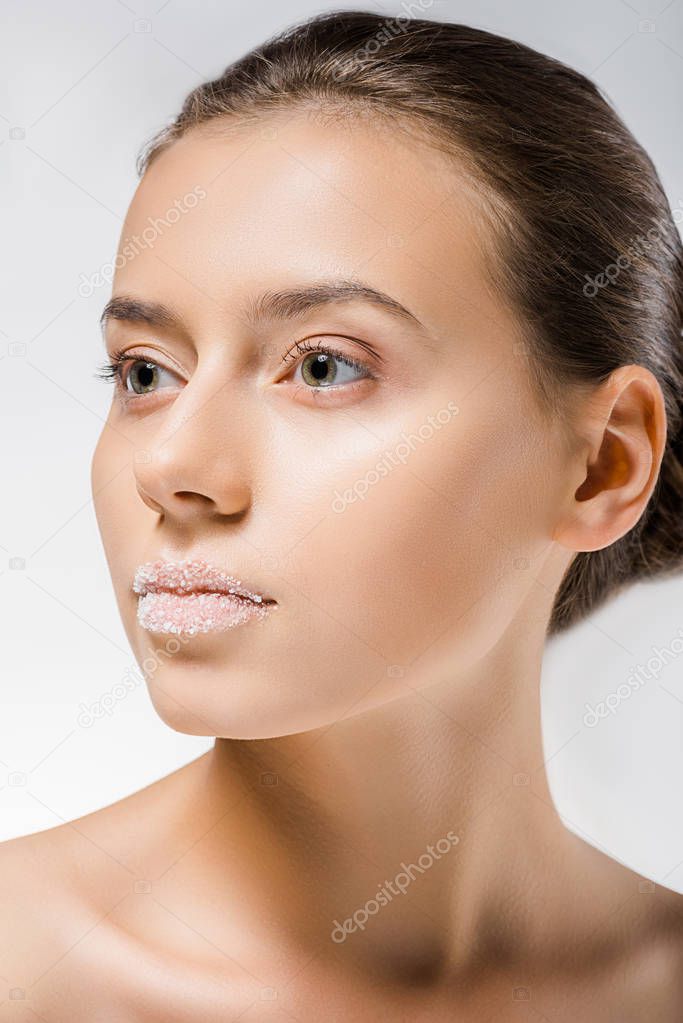 young beautiful woman with sugar on lips