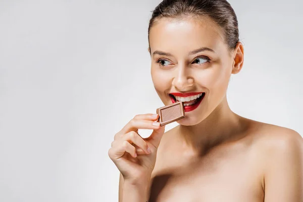 Young Beautiful Woman Red Lips Biting Chocolate Piece — Stock Photo, Image
