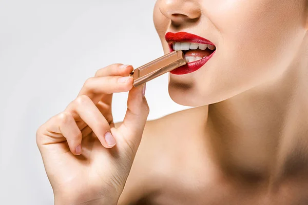 Close Young Beautiful Woman Red Lips Biting Chocolate Piece — Stock Photo, Image