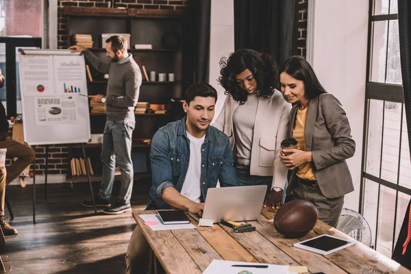 Enthusiastic Casual Businesspeople Using Laptop Working Together Loft Office — Stock Photo, Image