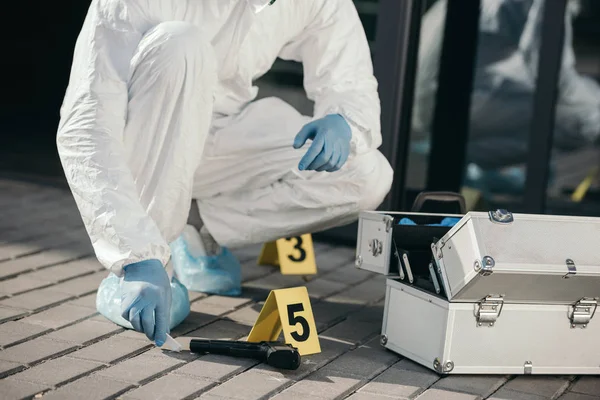 Cropped View Male Criminologist Protective Suit Latex Gloves Sitting Evidence — Stock Photo, Image