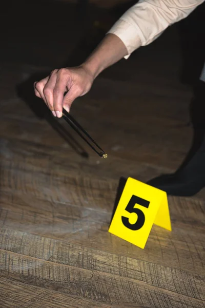 Cropped View Hand Examining Evidence Crime Scene — Free Stock Photo