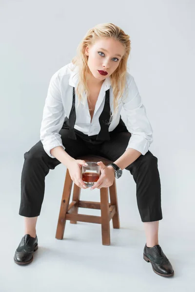 Attractive Fashionable Model Glass Whiskey Sitting Stool Grey — Stock Photo, Image