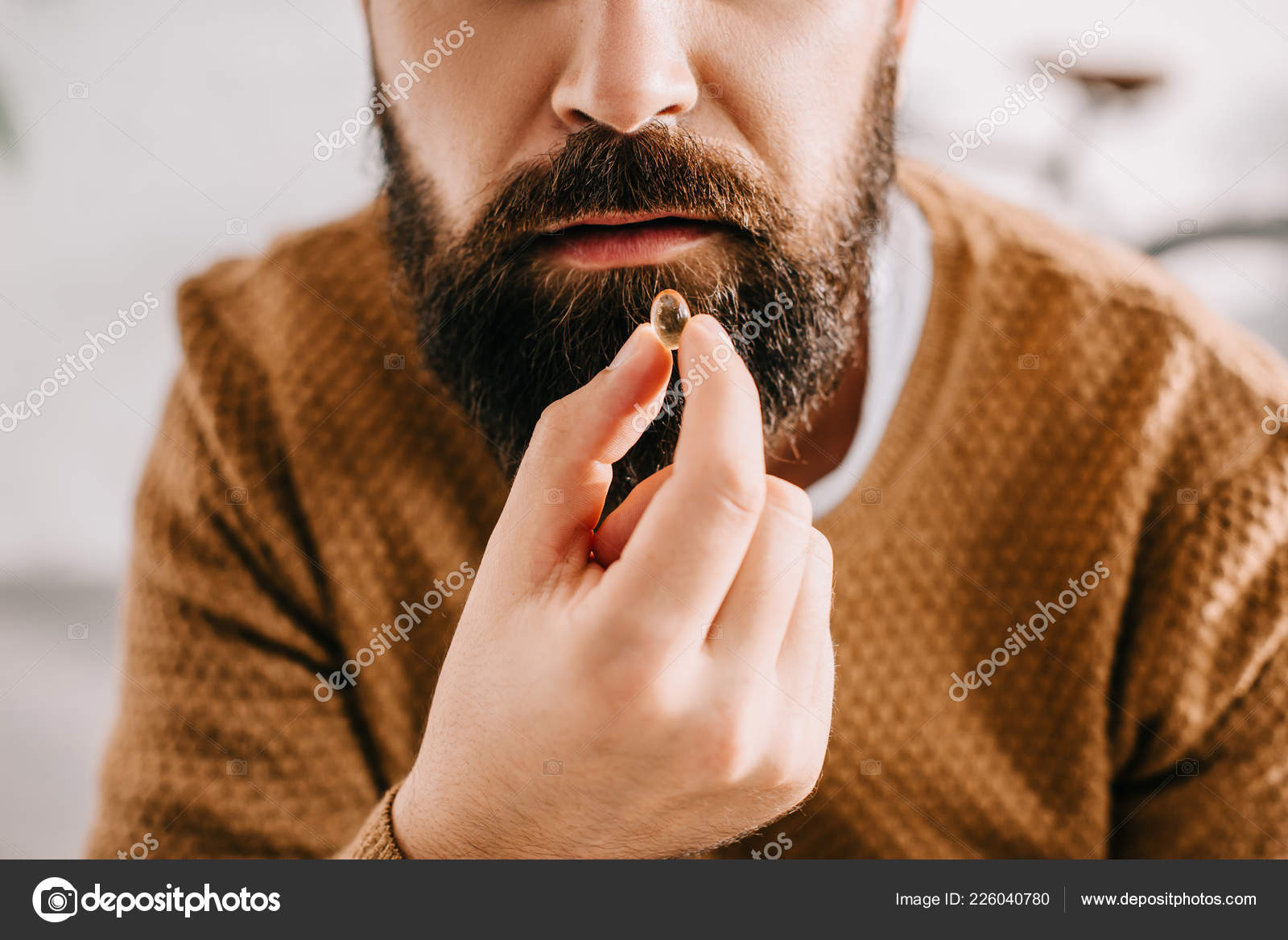 Close Up Of Sick Bearded Man Taking Pill From Illness P O By Vitalikradko Close Up Of Sick Bearded Man Taking Pill From Illness P O By Vitalikradko