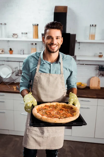 High Angle View Smiling Young Man Apron Potholders Holding Baking — Stock Photo, Image