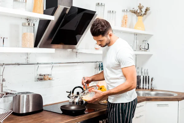 Handsome Young Man Pajamas Cooking Omelette Frying Pan Morning — Stock Photo, Image