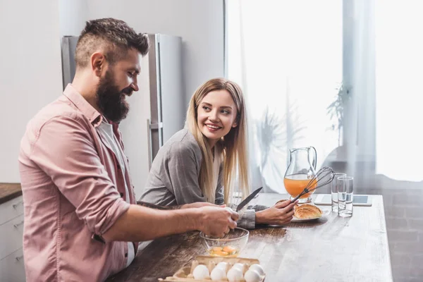 Cheerful Couple Cooking Breakfast Together — Free Stock Photo