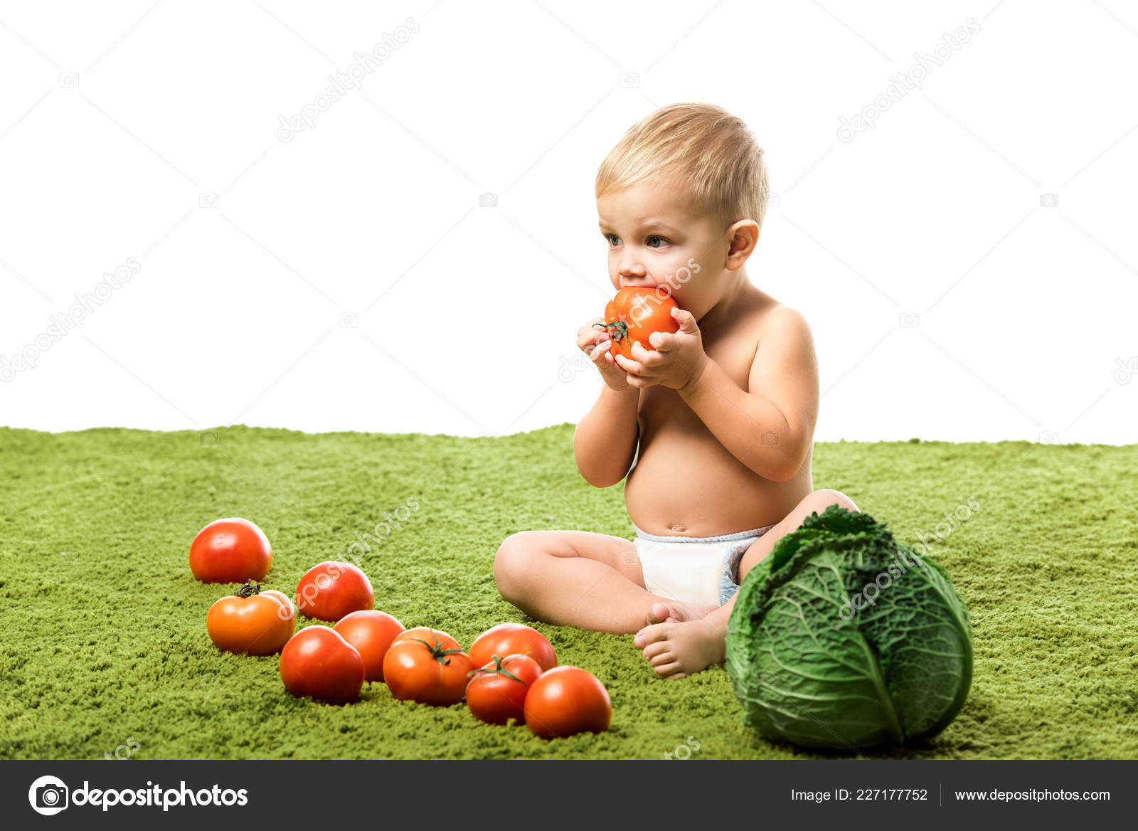 Cute Toddler Boy Eating Tomato Sitting Green Carpet Vegetables Isolated