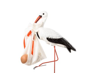 decorative stork holding baby nappy with doll isolated on white clipart