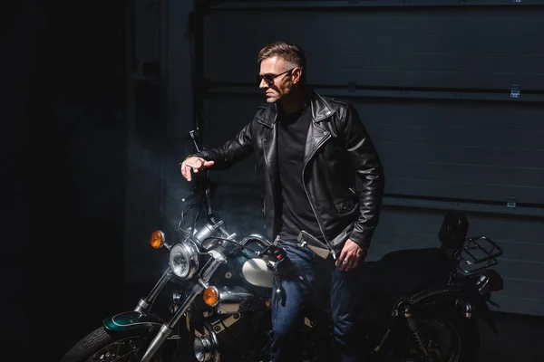 Fashionable Guy Black Sunglasses Standing Motorcycle Garage — Stock Photo, Image