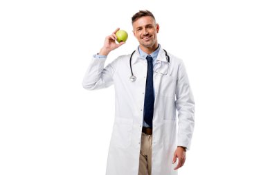 Doktor holding yeşil elma el gülümseyen izole beyaz, sağlıklı beslenme kavramı