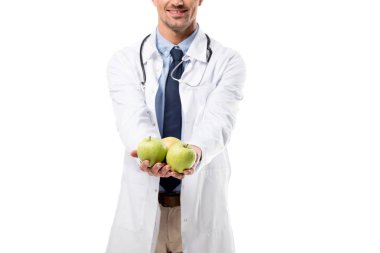 taze elma izole beyaz, sağlıklı beslenme kavramı üzerinde elinde tutan Doktor kırpılmış görünümünü