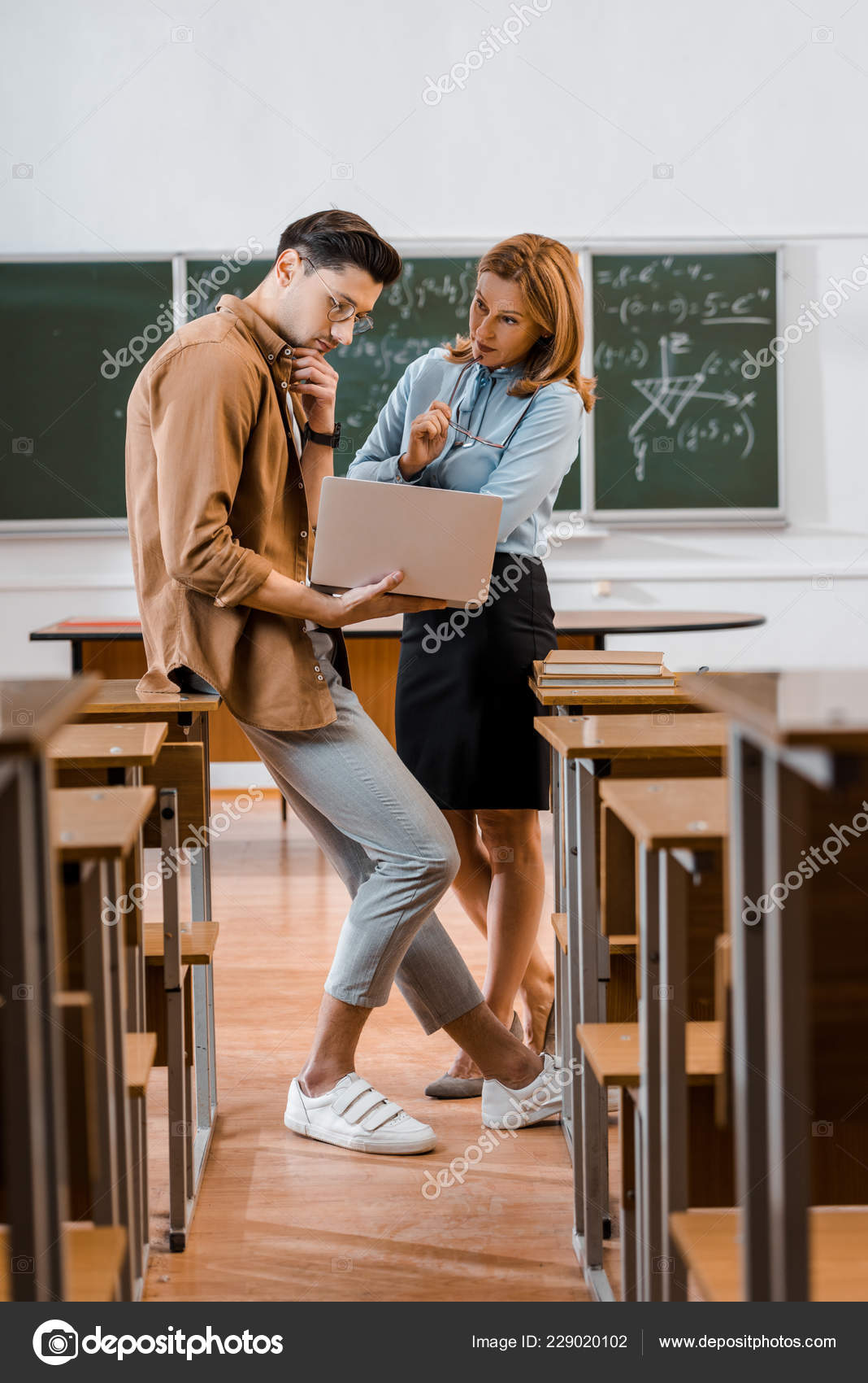 aged teacher banging their male student