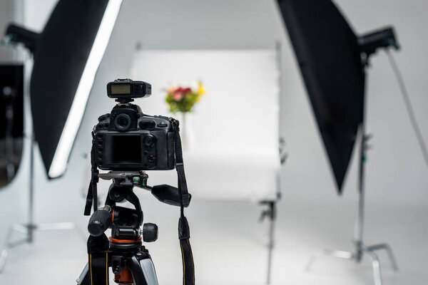 close-up view of professional photo camera in photo studio 