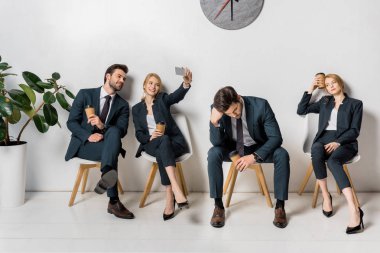 collage of business people with various emotions and poses waiting on chairs in line clipart
