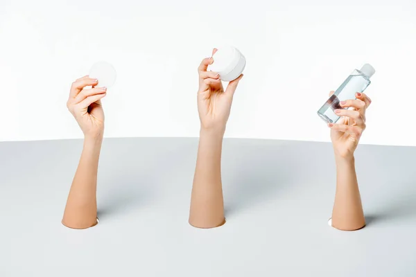 Cropped Shot Women Holding Cream Lotion Cotton Pad Holes White — Stock Photo, Image