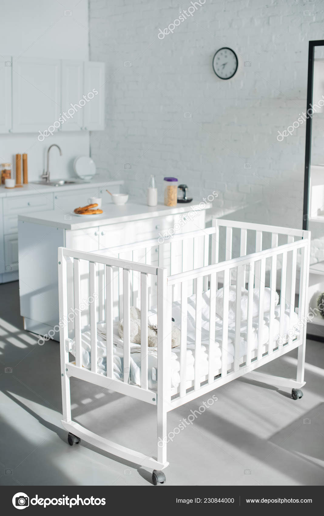 white modern baby crib