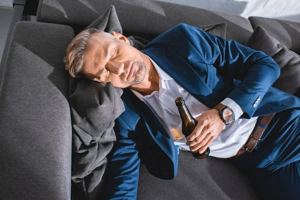 Drunk Businessman Holding Bottle Sleeping Sofa Living Room — Stock Photo, Image