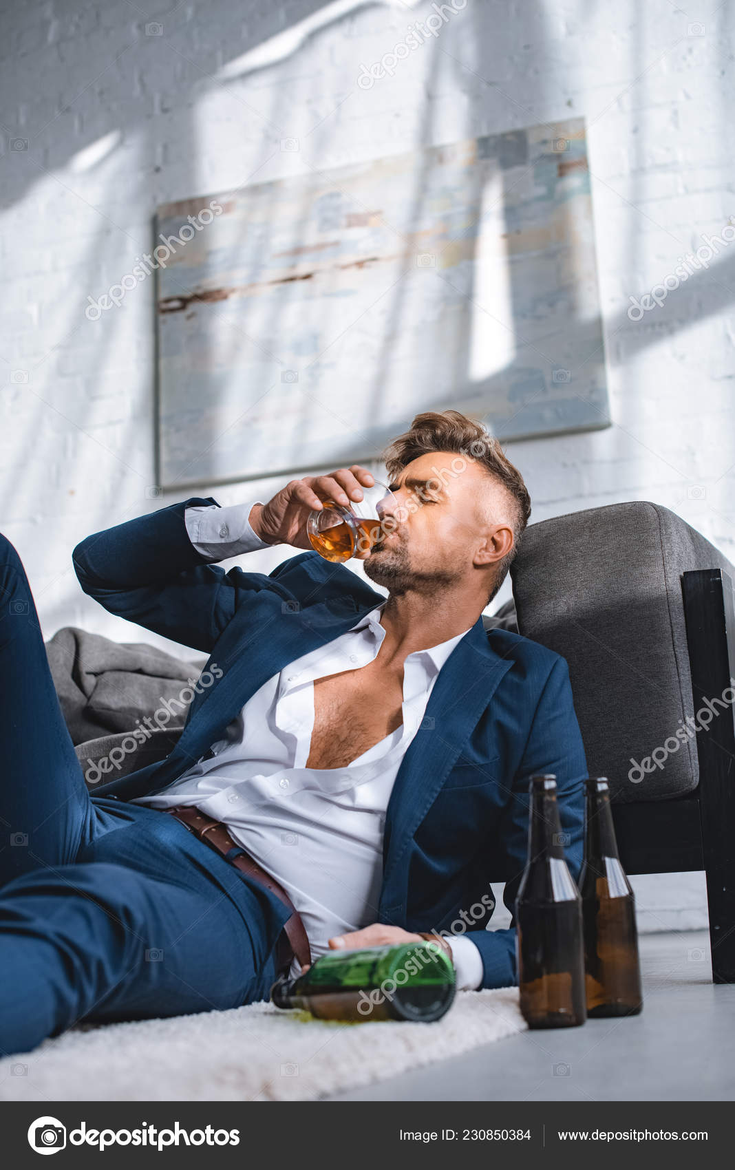 Depressed Businessman Drinking Whiskey Bottles Living Room Stock Photo