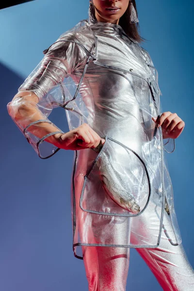 Partial View Fashionable Model Silver Bodysuit Raincoat Posing Fish Pocket — Free Stock Photo