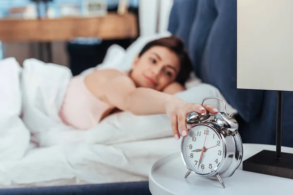 Selective Focus Young Woman Turning Alarm Clock Bedroom Morning Time — Stock Photo, Image