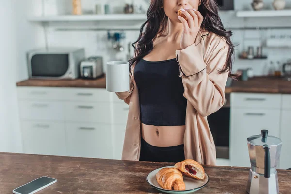 Partial View Woman Having Breakfast Croissants Coffee Wooden Table Kitchen — Stock Photo, Image