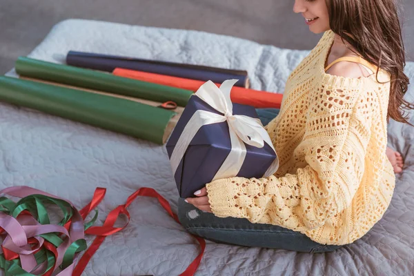 Partial View Young Woman Holding Gift Box Wrapped Ribbon While — Stock Photo, Image