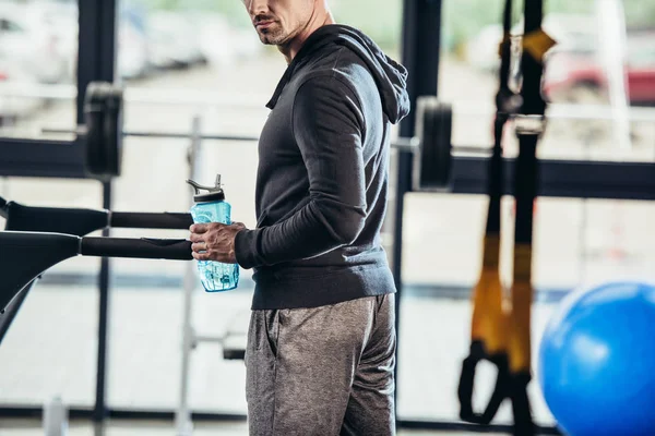 Cropped Image Sportsman Hoodie Standing Treadmill Sport Bottle Gym — Free Stock Photo