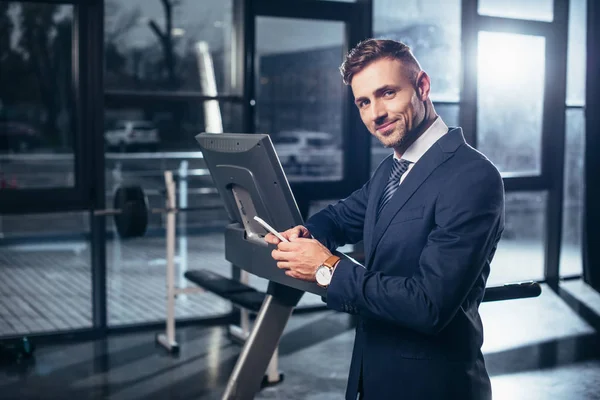 Handsome Businessman Suit Leaning Treadmill Using Smartphone Gym — Stock Photo, Image