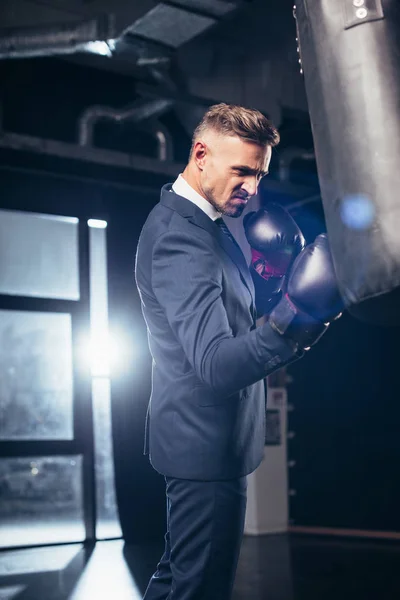 Handsome Businessman Suit Grimacing While Boxing Gym — Free Stock Photo