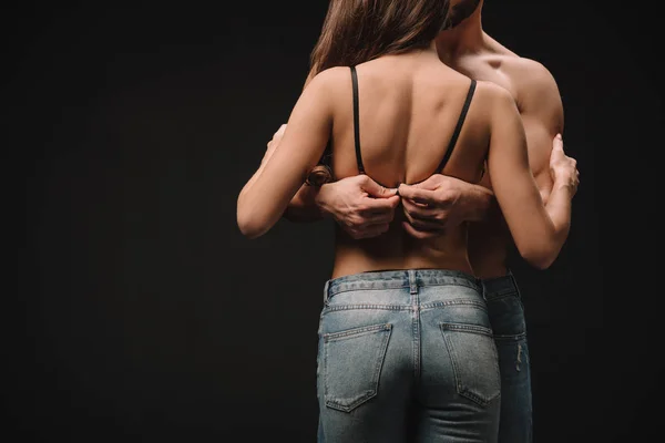 Rückseite Des Mannes Entkleidet Erotische Mädchen Isoliert Auf Schwarz — Stockfoto